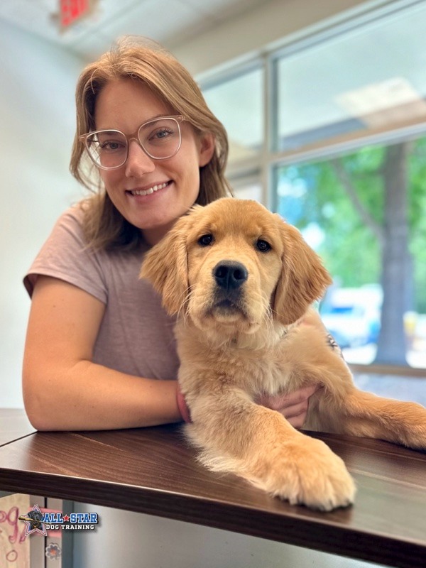 trainer and a puppy