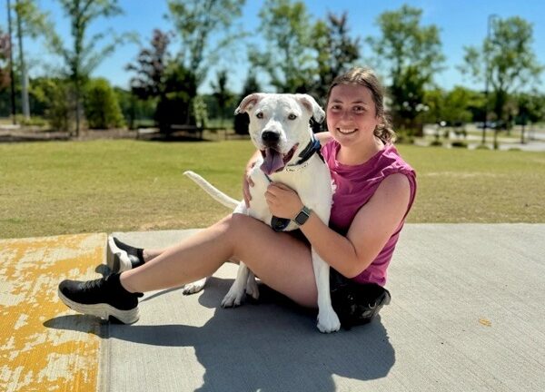 owner and her white dog